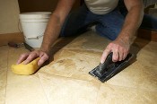 Worker Installing Decorative Tiles Worker Installing Decorative Tiles